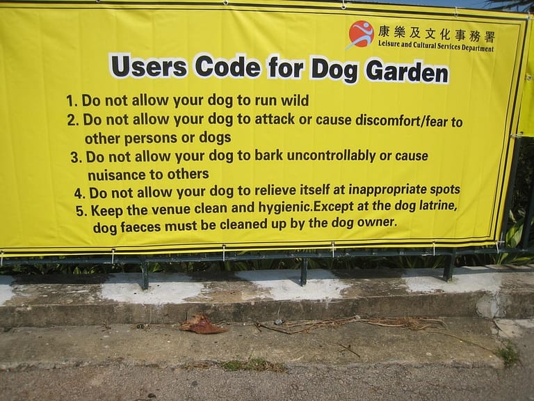 a sign on a wall - File:Substitute 'Blogs' for 'Dogs' (2889395915).jpg