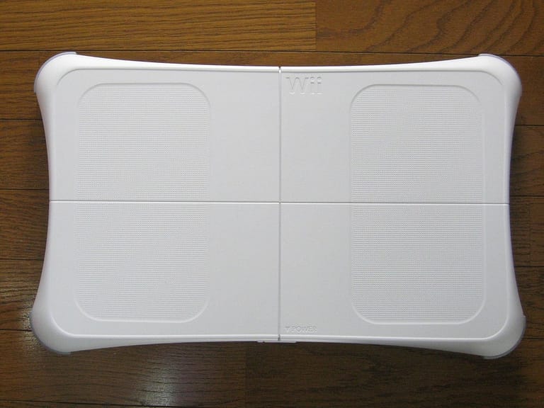 a white bathroom scaler with a white surface - Wii Balance Board