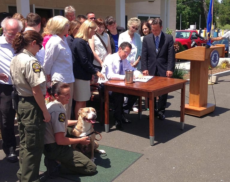 Signing legislation increasing standards for care of animals at pet shops (14449287441) - Image of P